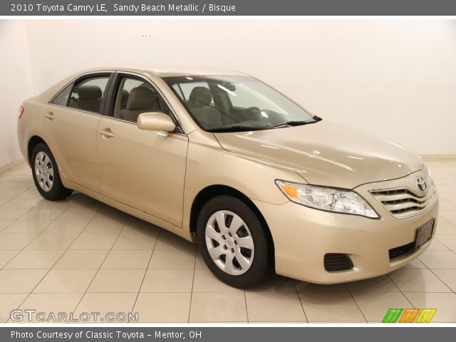 2010 Toyota Camry LE in Sandy Beach Metallic
