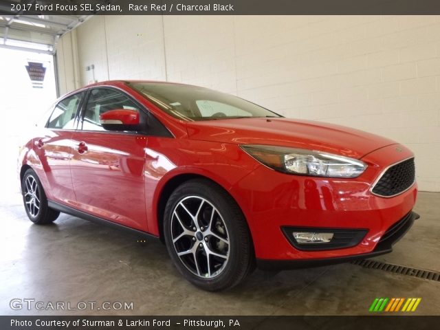 2017 Ford Focus SEL Sedan in Race Red