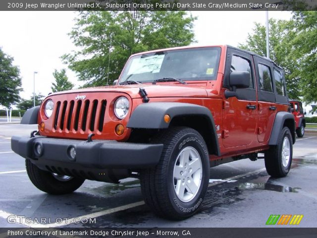 2009 Jeep Wrangler Unlimited X in Sunburst Orange Pearl
