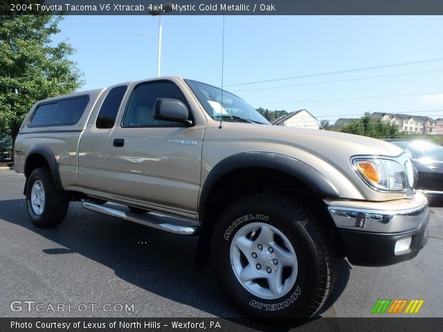 2004 Toyota Tacoma V6 Xtracab 4x4 in Mystic Gold Metallic