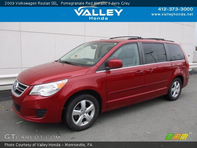2009 Volkswagen Routan SEL in Pomegranate Red Metallic