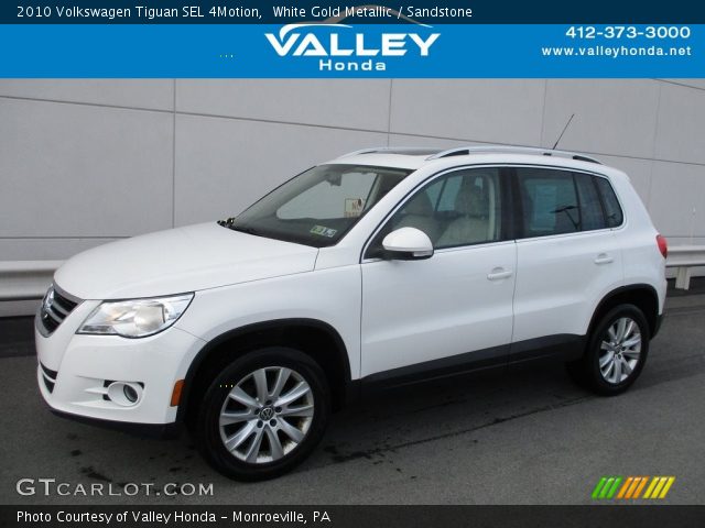 2010 Volkswagen Tiguan SEL 4Motion in White Gold Metallic
