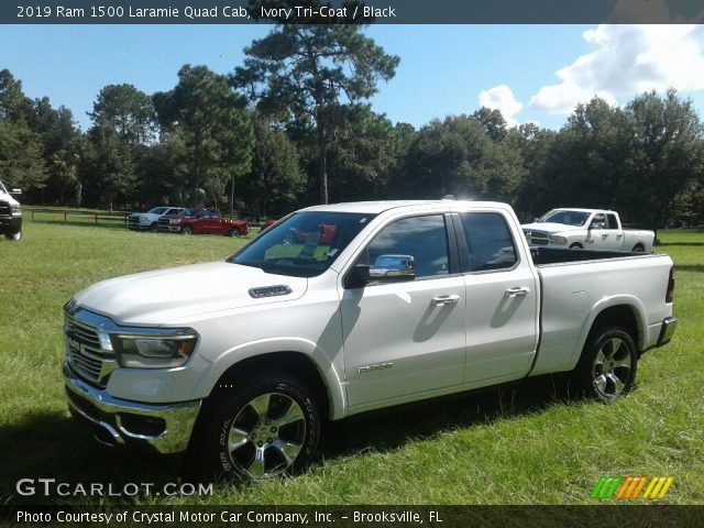 2019 Ram 1500 Laramie Quad Cab in Ivory Tri–Coat