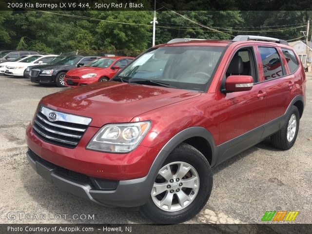 2009 Kia Borrego LX V6 4x4 in Spicy Red