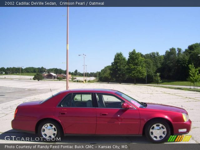 2002 Cadillac DeVille Sedan in Crimson Pearl