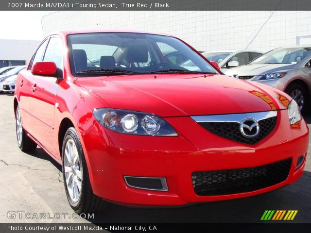 2007 Mazda MAZDA3 i Touring Sedan in True Red