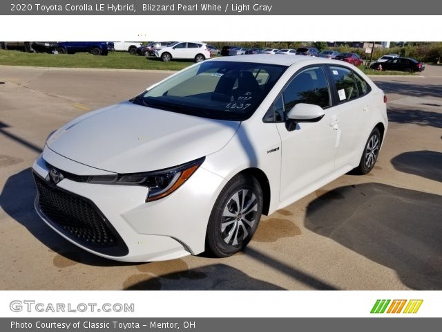 2020 Toyota Corolla LE Hybrid in Blizzard Pearl White