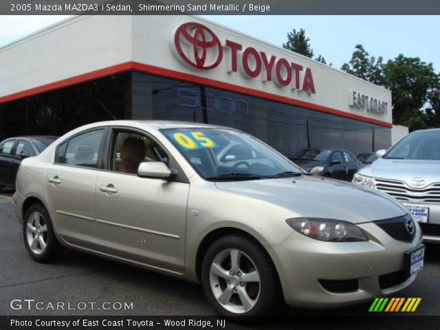 2005 Mazda MAZDA3 i Sedan in Shimmering Sand Metallic