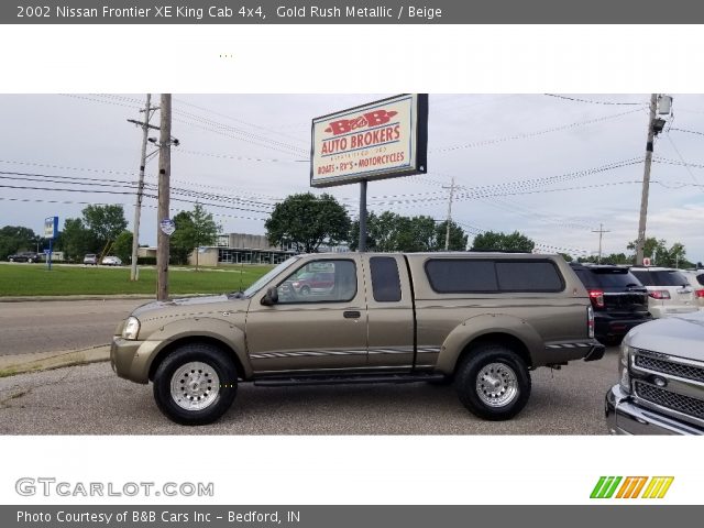 2002 Nissan Frontier XE King Cab 4x4 in Gold Rush Metallic