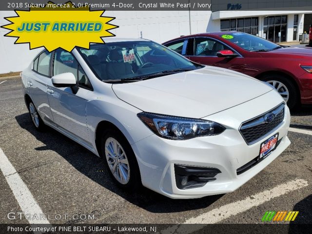 2018 Subaru Impreza 2.0i Premium 4-Door in Crystal White Pearl