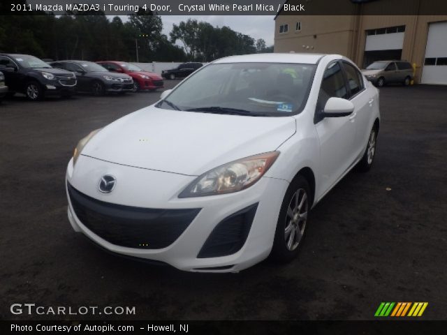 2011 Mazda MAZDA3 i Touring 4 Door in Crystal White Pearl Mica