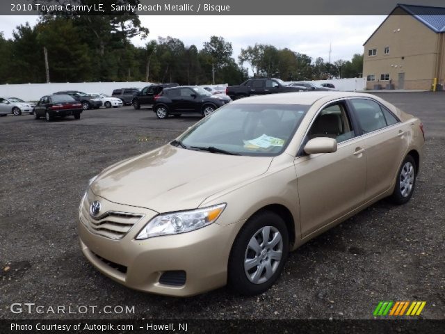 2010 Toyota Camry LE in Sandy Beach Metallic