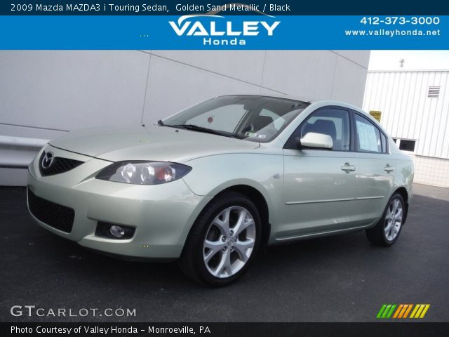 2009 Mazda MAZDA3 i Touring Sedan in Golden Sand Metallic