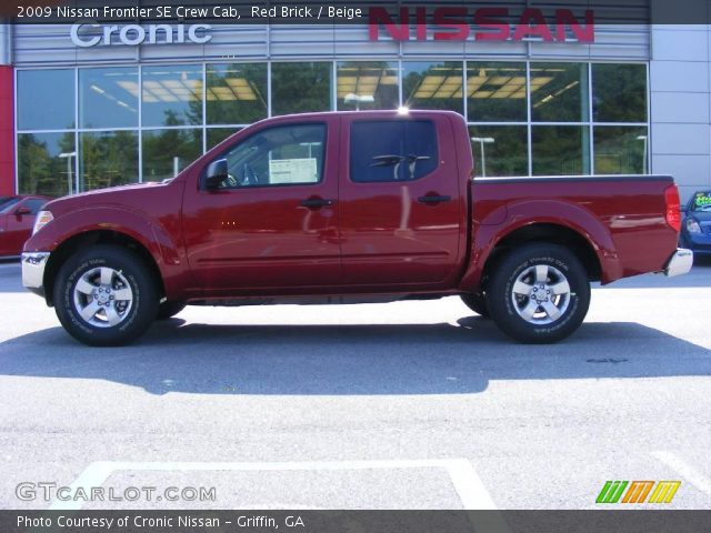 2009 Nissan Frontier SE Crew Cab in Red Brick