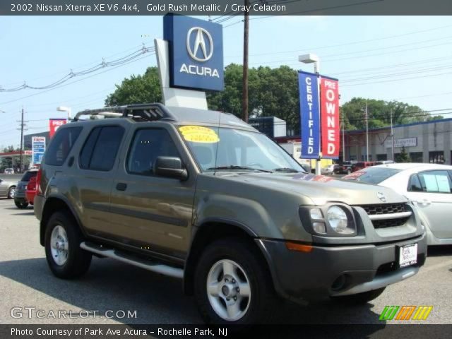 2002 Nissan Xterra XE V6 4x4 in Gold Rush Metallic