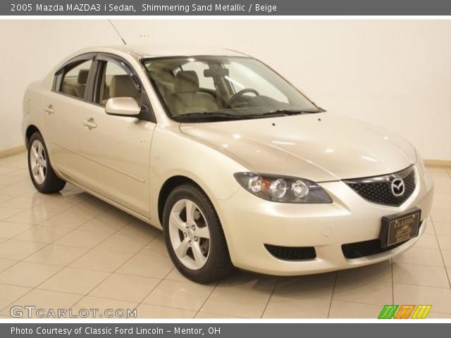 2005 Mazda MAZDA3 i Sedan in Shimmering Sand Metallic