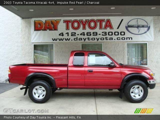 2003 Toyota Tacoma Xtracab 4x4 in Impulse Red Pearl