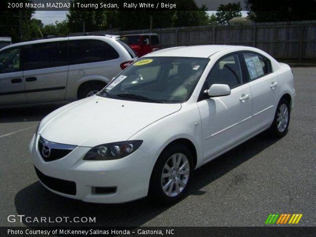 2008 Mazda MAZDA3 i Touring Sedan in Rally White