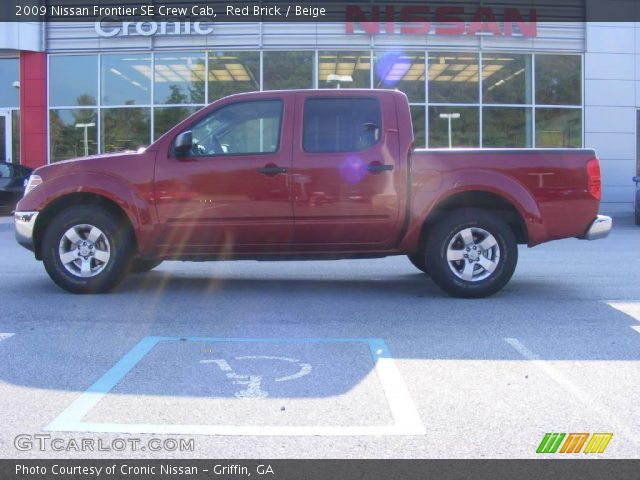 2009 Nissan Frontier SE Crew Cab in Red Brick
