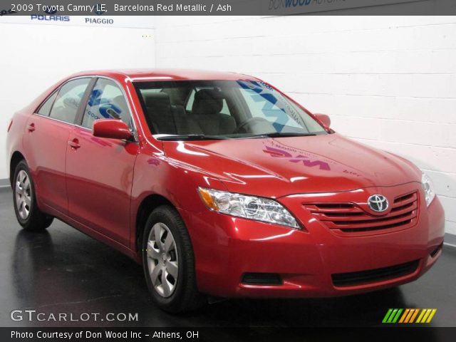 2009 Toyota Camry LE in Barcelona Red Metallic