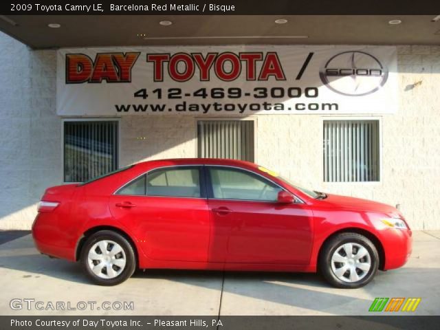 2009 Toyota Camry LE in Barcelona Red Metallic