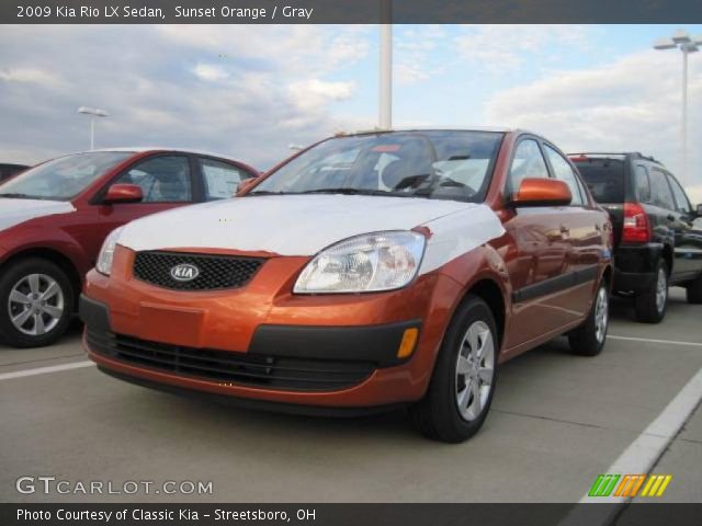 2009 Kia Rio LX Sedan in Sunset Orange