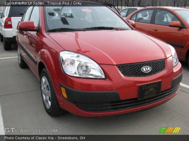 2009 Kia Rio LX Sedan in Tropical Red