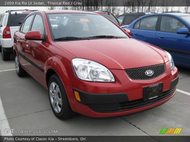 2009 Kia Rio LX Sedan in Tropical Red