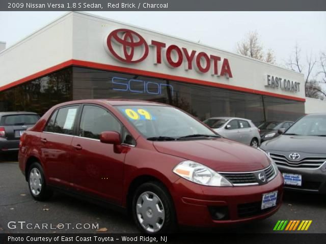 2009 Nissan Versa 1.8 S Sedan in Red Brick
