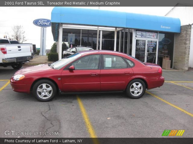2001 Ford Taurus SEL in Toreador Red Metallic