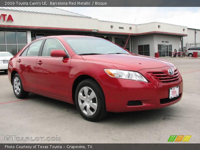 2009 Toyota Camry LE in Barcelona Red Metallic