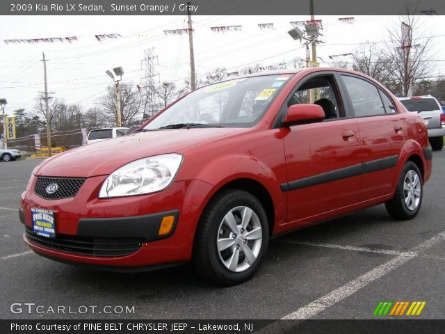 2009 Kia Rio LX Sedan in Sunset Orange