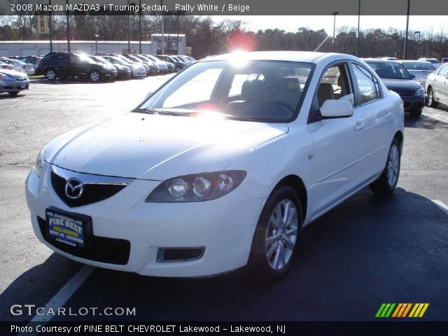 2008 Mazda MAZDA3 i Touring Sedan in Rally White