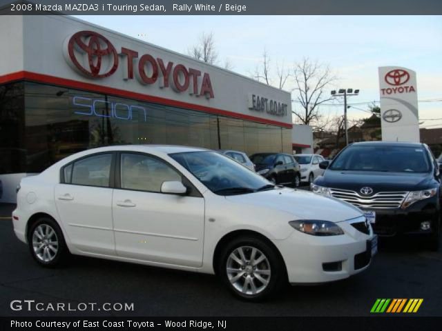 2008 Mazda MAZDA3 i Touring Sedan in Rally White