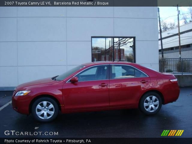 2007 Toyota Camry LE V6 in Barcelona Red Metallic