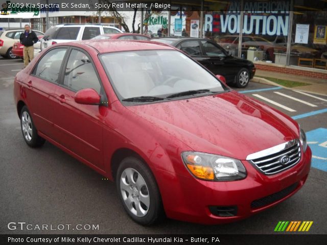 2009 Kia Spectra EX Sedan in Spicy Red Metallic