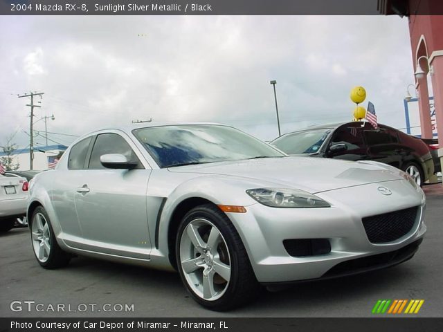 2004 Mazda RX-8  in Sunlight Silver Metallic
