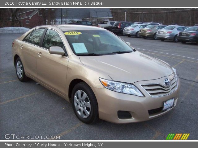 2010 Toyota Camry LE in Sandy Beach Metallic