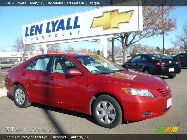 2009 Toyota Camry LE in Barcelona Red Metallic