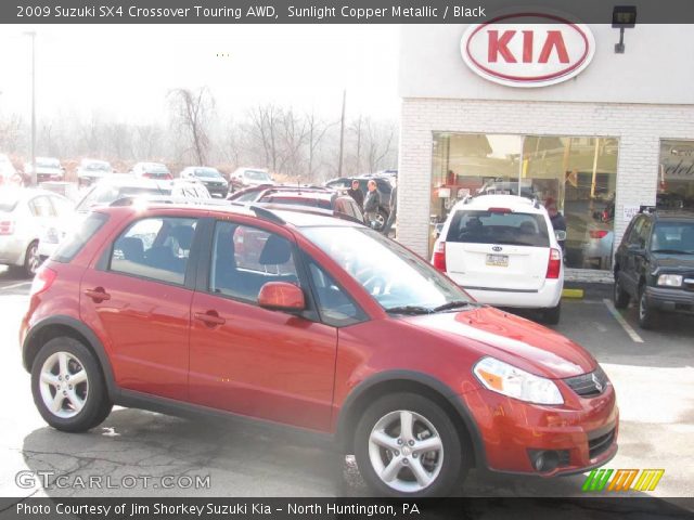 2009 Suzuki SX4 Crossover Touring AWD in Sunlight Copper Metallic