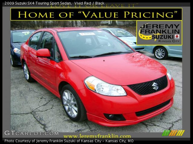 2009 Suzuki SX4 Touring Sport Sedan in Vivid Red