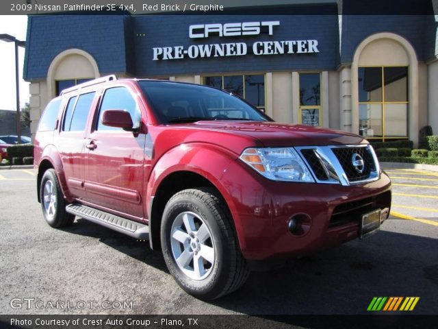 2009 Nissan Pathfinder SE 4x4 in Red Brick