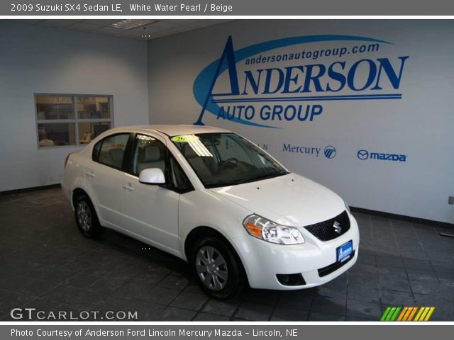 2009 Suzuki SX4 Sedan LE in White Water Pearl