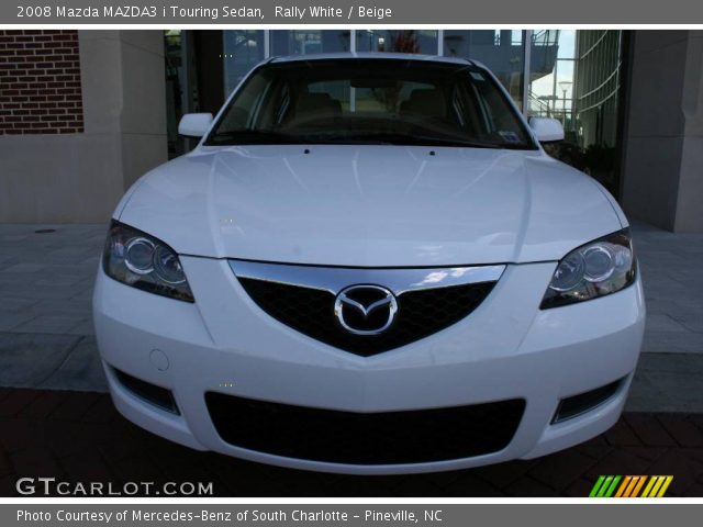 2008 Mazda MAZDA3 i Touring Sedan in Rally White