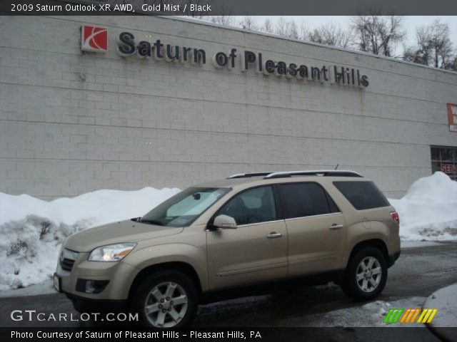 2009 Saturn Outlook XR AWD in Gold Mist