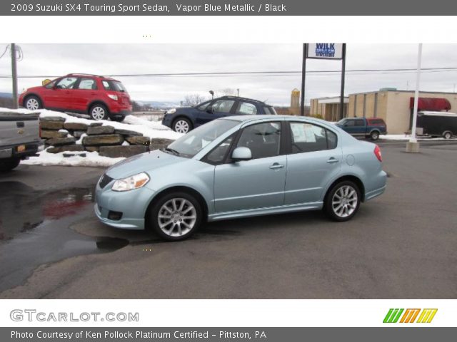 2009 Suzuki SX4 Touring Sport Sedan in Vapor Blue Metallic