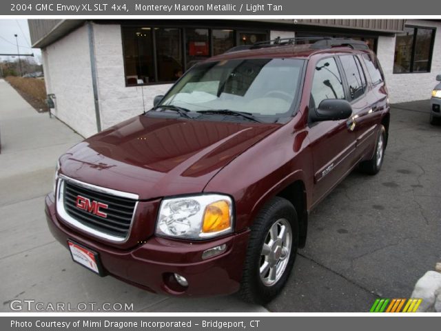 Monterey Maroon Metallic 2004 GMC Envoy XL SLT 4x4 with Light Tan interior 