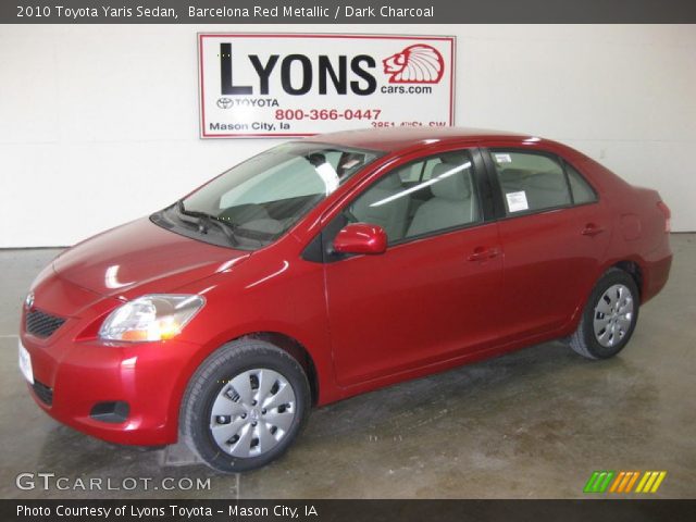 2010 Toyota Yaris Sedan in Barcelona Red Metallic