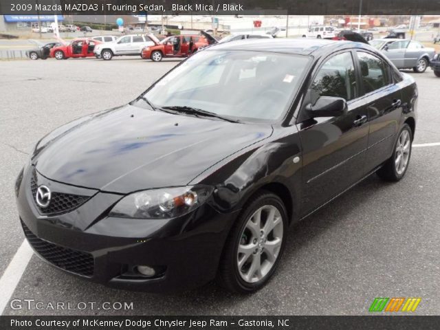 2009 Mazda MAZDA3 i Touring Sedan in Black Mica