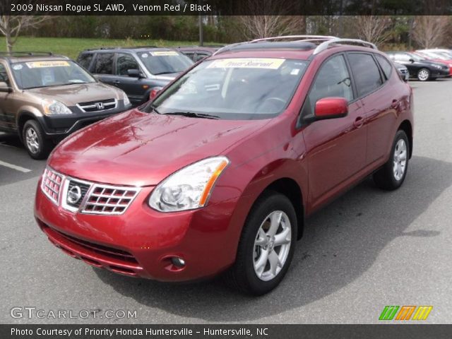 2009 Nissan Rogue SL AWD in Venom Red